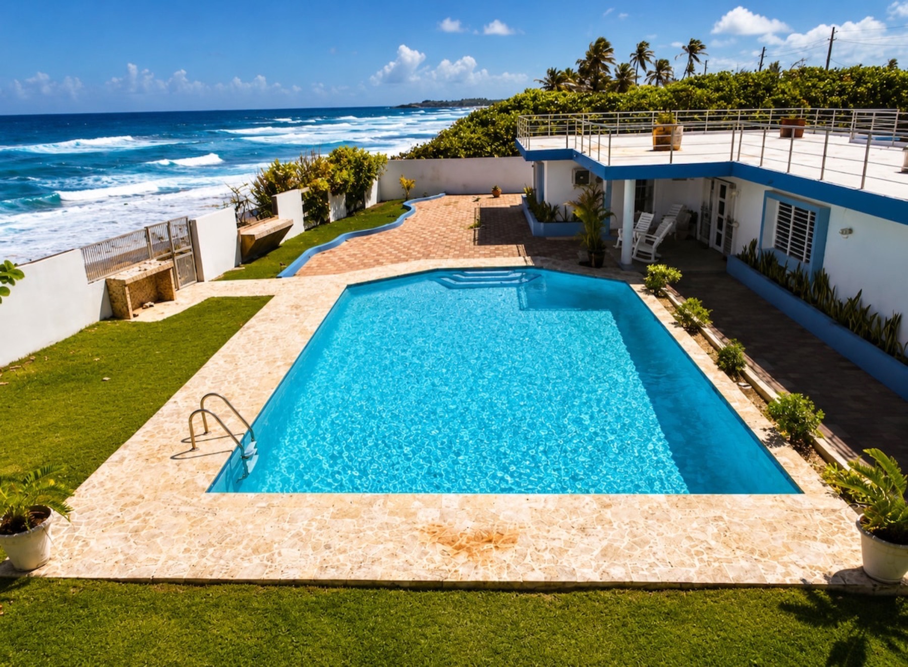 Catalina del Mar saltwater pool with the Atlantic Ocean beyond